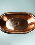 aged copper vessel sink