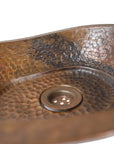 aged copper vessel bathroom sink