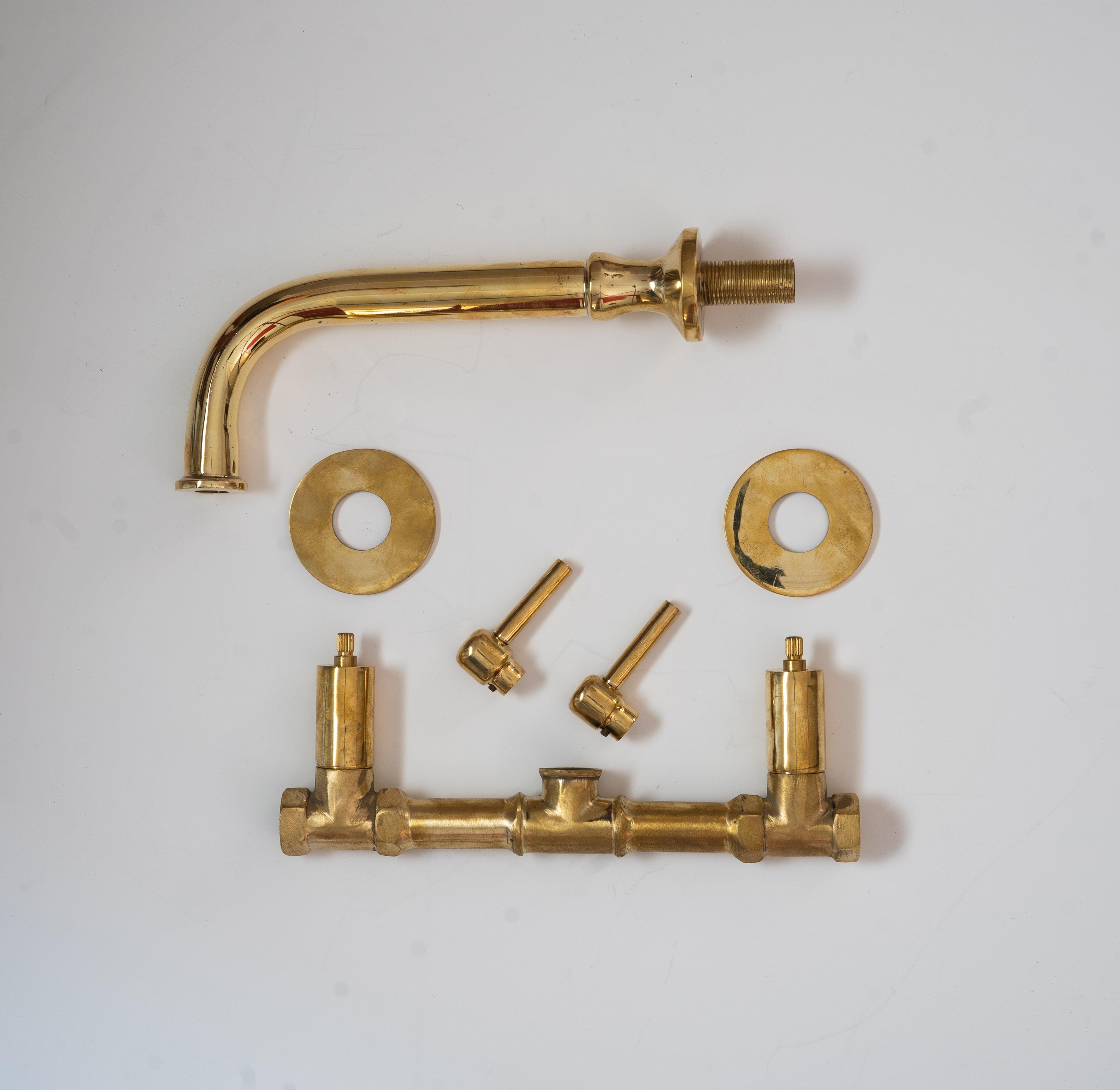 brass wall mount bathroom tap